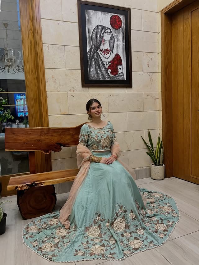 ✨ MEHER A poetic expression of heritage in bloom. Sculpted in luminous kathan silk, Meher comes alive through intricate kora dabka and delicate threadwork, unfolding into floral motifs across the lehnga and richly embellished choli. A soft tea-pink net dupatta completes the look with an embroidered